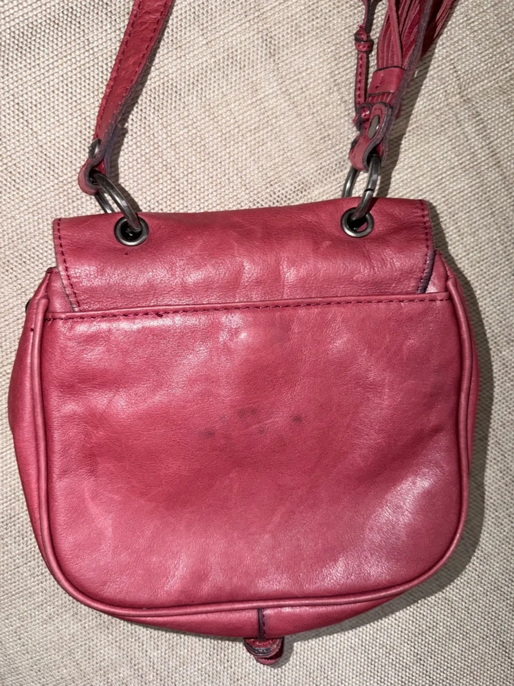 Patricia Nash Karis Leather Whipstitch Saddle Bag in a rich red/berry